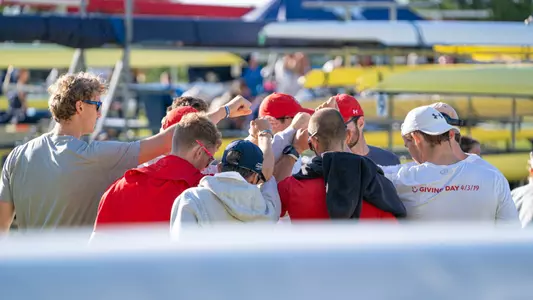Photo of the BU Men's Rowing Second Varsity 8 huddling up before the IRA Championship Semifinal.