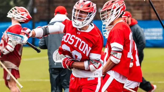 Mario Hemann celebrating on the BU sideline