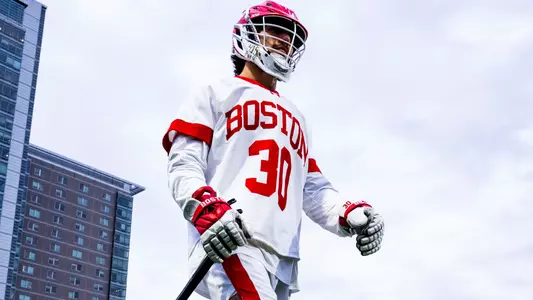 Mario Hemann walking along the BU sideline