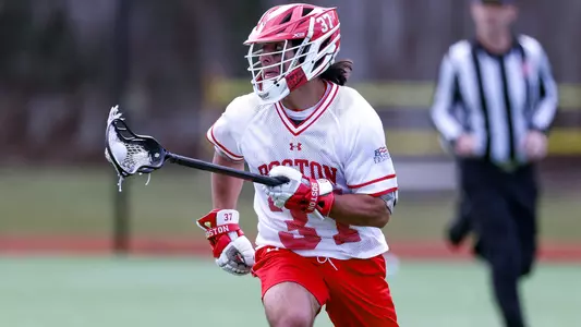 Benjamin Ferrara playing lacrosse