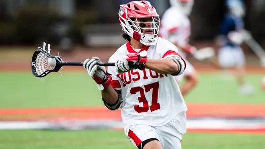 Benjamin Ferrara playing lacrosse