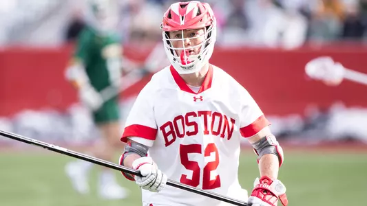 Aden Johnson playing lacrosse