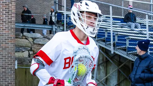 Michael Kitevski walking out to the lacrosse field