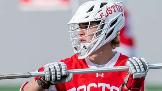 Nathaniel Laquis playing lacrosse