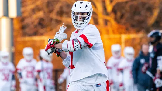 Miles Lipton playing lacrosse