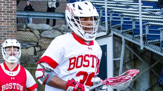 Tre Moore walking out to the lacrosse field