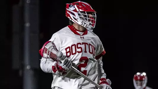 Thomas Niedringhaus playing lacrosse