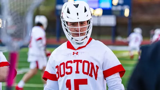 Rich Rindos standing on a lacrosse field