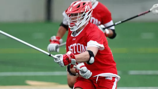 Logan Styles playing lacrosse