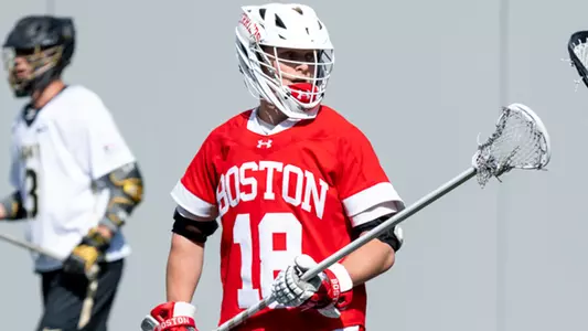 Logan Styles playing lacrosse