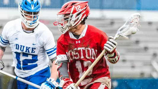 Zach Travaglini playing lacrosse