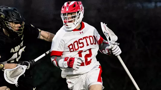 Zach Travaglini playing lacrosse