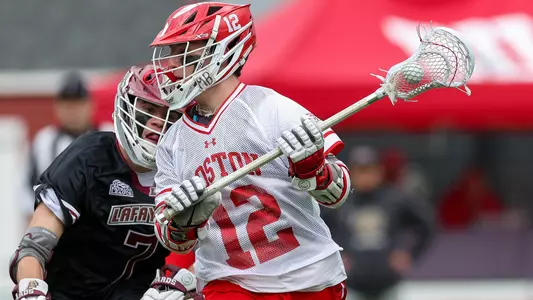 Zach Travaglini playing lacrosse