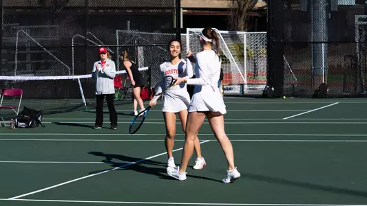 Kaitlin Tan and Victoria Carlsten celebrate a doubles point