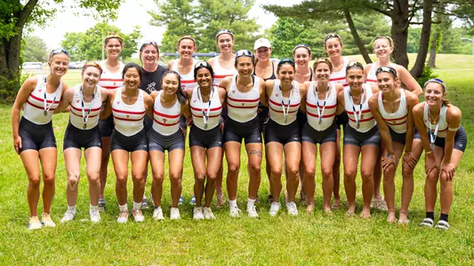 Photo of the BU Lightweight Rowing team after competing at the IRA Championship.