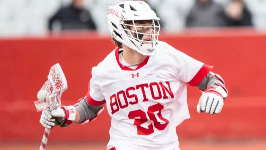 Luke Davis playing lacrosse