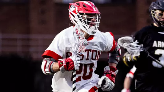 Luke Davis playing lacrosse