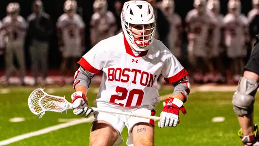 Luke Davis playing lacrosse