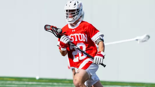 Luke Davis playing lacrosse