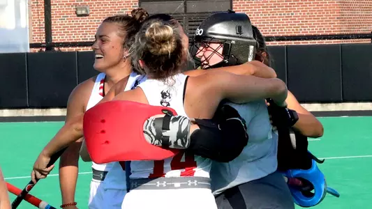 Team congratulates Sophie Ortyl after her first collegiate shutout at Providence