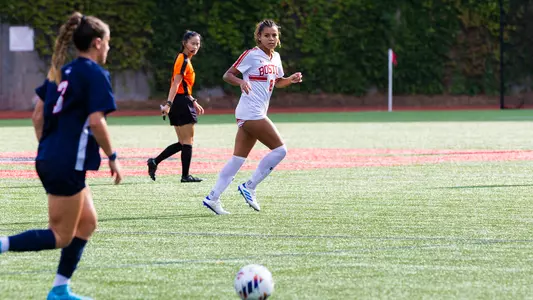 Photo of women's soccer sophomore Kaiya Stewart watching a play develop at Nickerson Field.