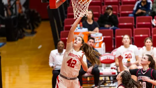 Photo of women's basketball freshman Allison Schwertner shooting a layup at Case Gym.