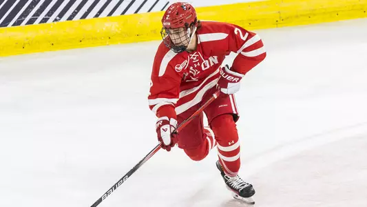 Gavin McCarthy skating with the puck