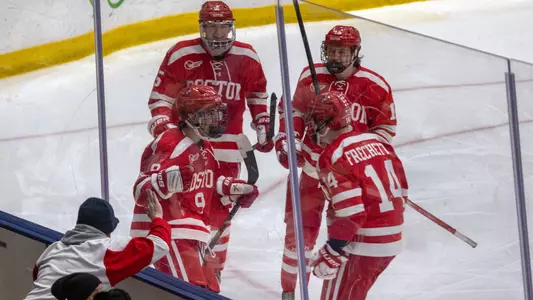 Ryan Greene celebrates his game-winning goal at UNH with three of his teammates
