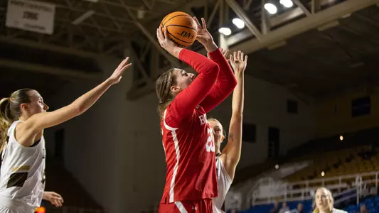 Photo of women's basketball junior Anete Adler shooting a layup at Lehigh.