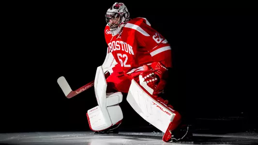 Mathieu Caron skating to the blue line during introductions at Agganis