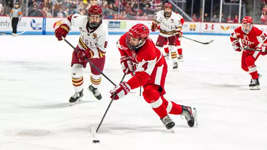Jack Hughes skating against Boston College