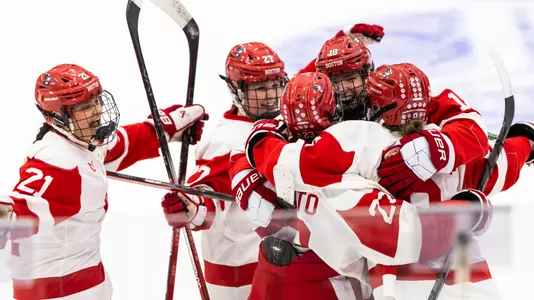 Women's Ice Hockey Celebrates Goal Against Holy Cross