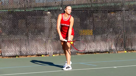 Blanka DeMicheli getting ready for a serve