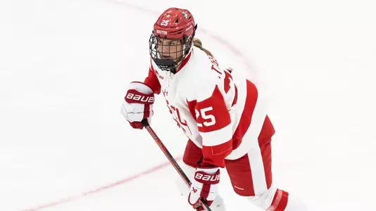 Ani FitzGerald playing hockey