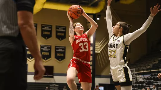 Photo of women's basketball freshman Inez Gallegos shooting a layup at Army West Point.