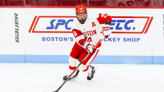 Maeve Kelly playing hockey