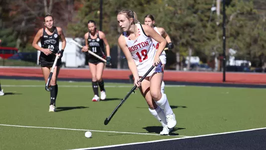 Martu Coulo dribbling down the sideline at Northeastern