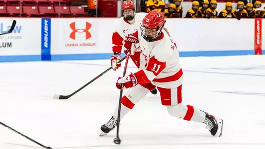 Sydney Healey shooting the puck against Minnesota 2025