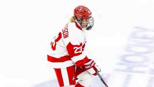 Greta Henderson Playing Hockey