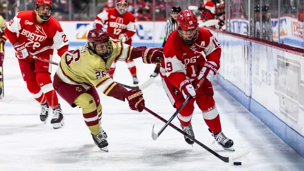 Clara Yuhn skating with the puck against BC