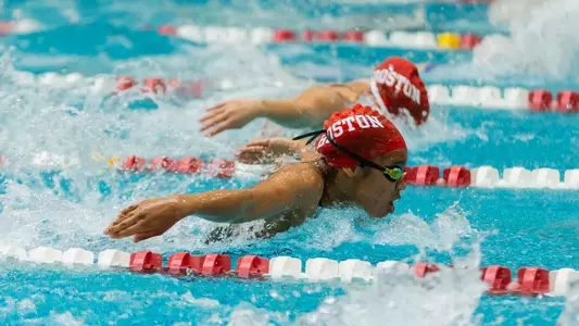 Photo of BU Women's Swimming racing at the FitRec Competition Pool