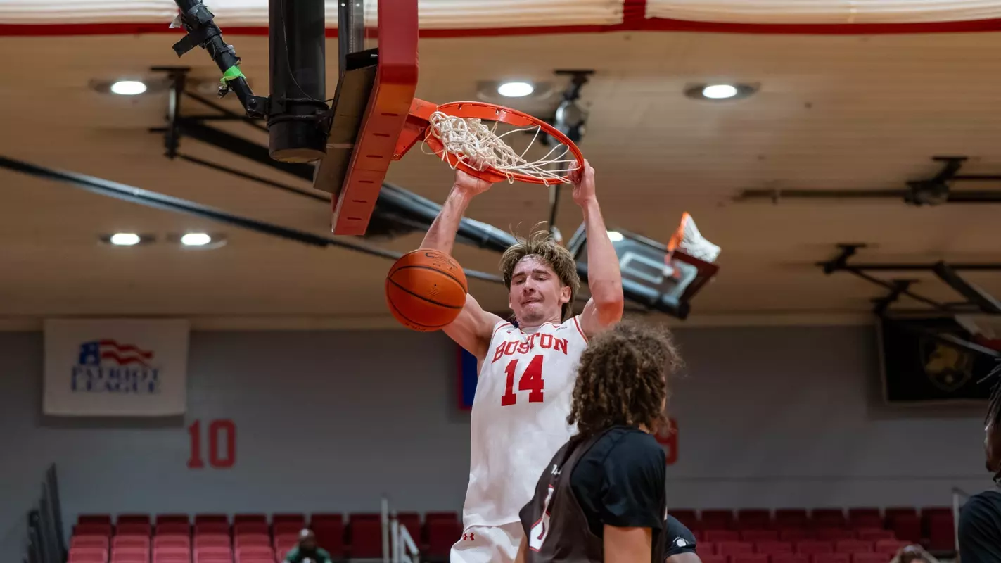 Ben Defty has a two-handed slam dunk against Brown