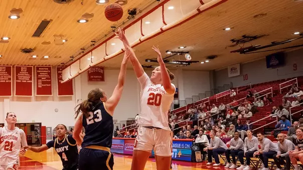Photo of BU women's basketball senior Anete Adler shooting a jumper against Navy at Case Gym.