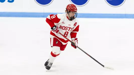 Maggie Hanzel playing hockey