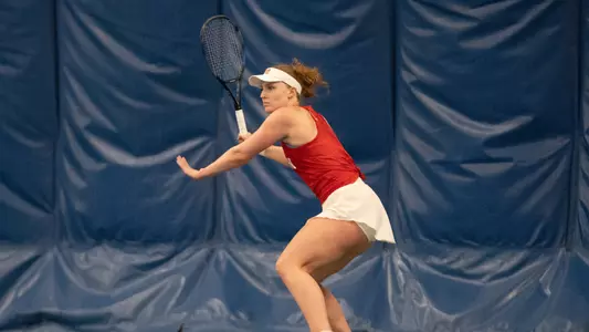 Nina Gulbransen playing tennis