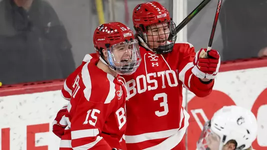 Matt Copponi and Tristan Amonte celebrate a goal at Northeastern