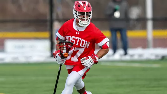 Benjamin Ferrara playing lacrosse