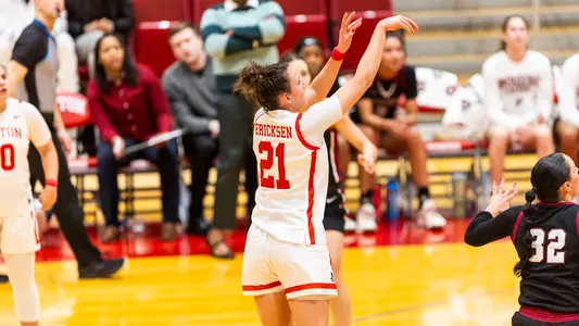 Photo of Audrey Ericksen shooting a jumper against Lafayette at Case Gym.
