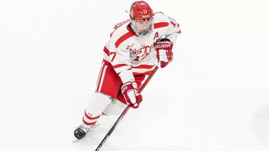 Quinn Hutson playing hockey