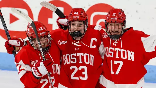 Women's Hockey celebrates overtime win over Northeastern